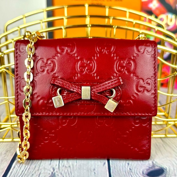 Gucci Handbags - Gucci red leather mini Guccissima wallet crossbody